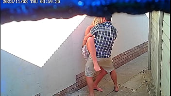 Voyeuristic couple caught on CCTV engaging in public sex outside restaurant